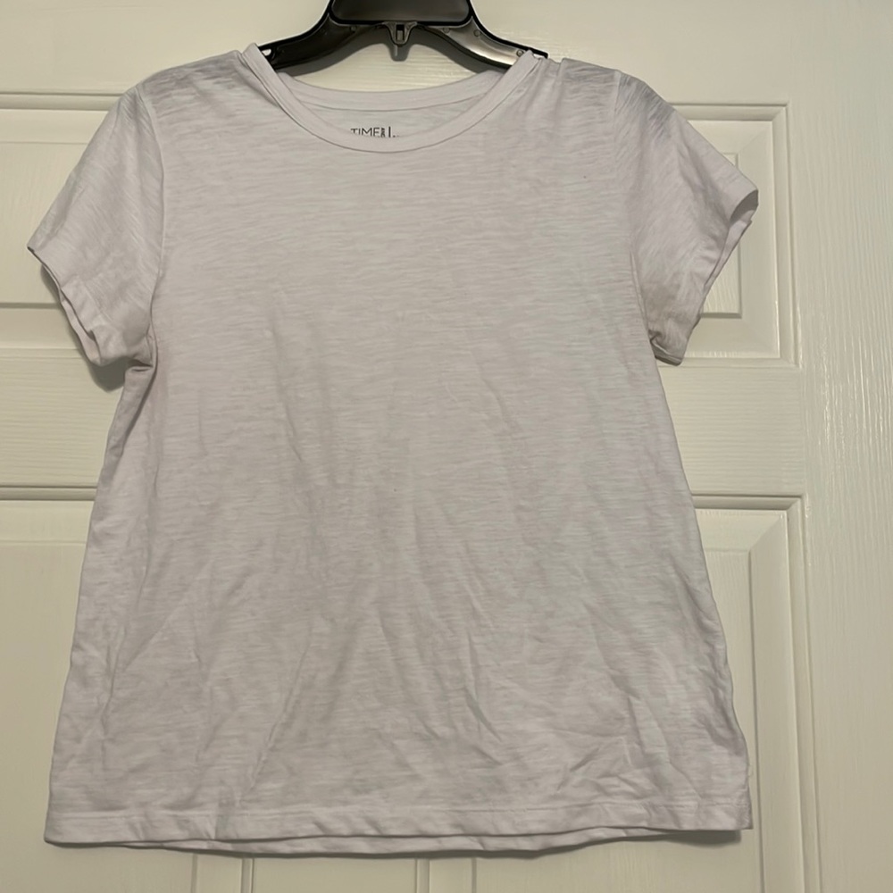 White womens Tshirt. Never worn!!
